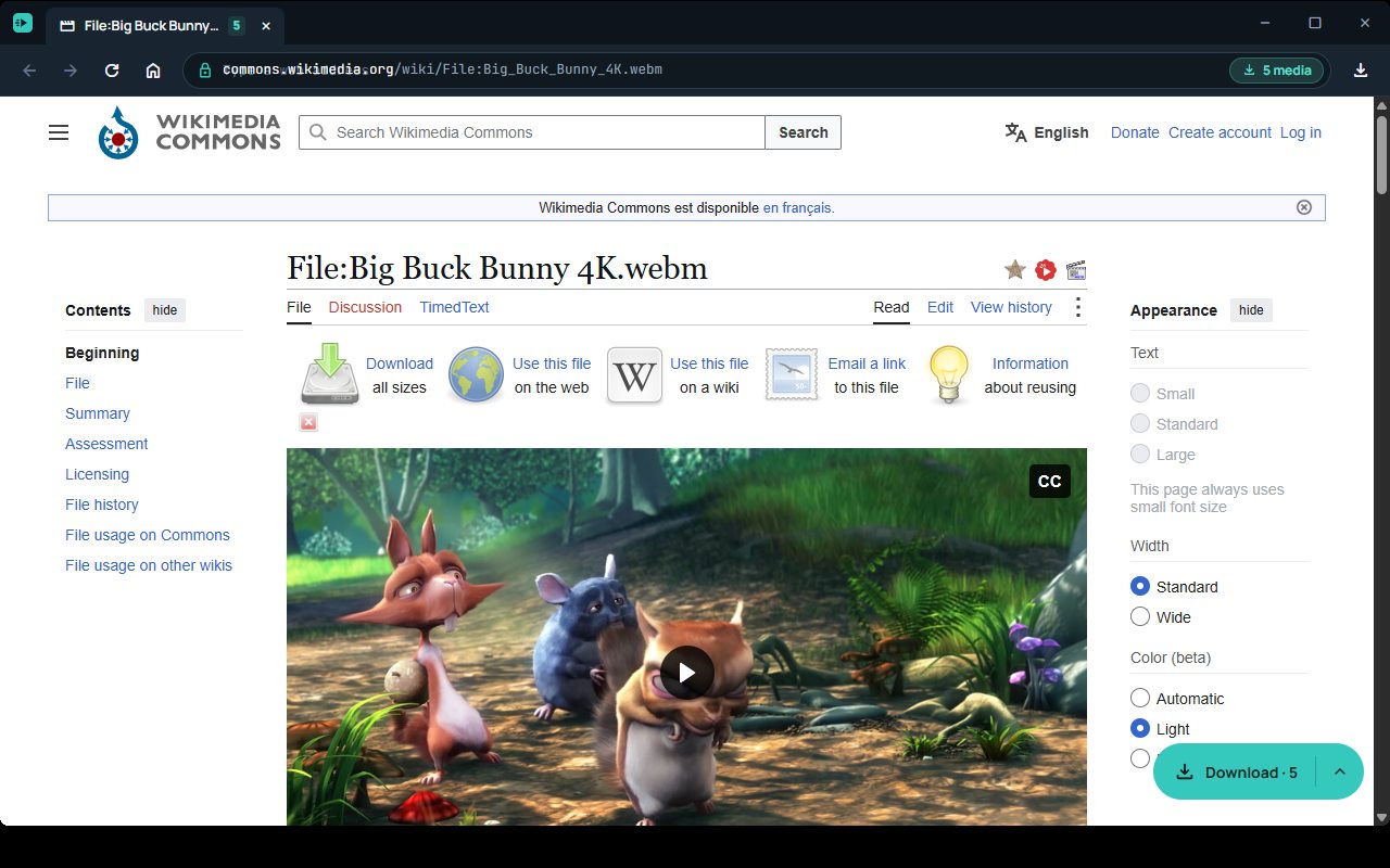 Miarina Media sous Windows : navigateur intégré sur une page Wikimedia Commons, bouton « Download · 5 »